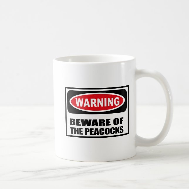L'avertissement PRENNENT GARDE de la tasse de (Droite)