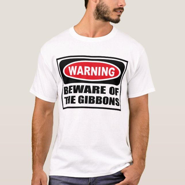L'avertissement PRENNENT GARDE du T-shirt de (Devant)