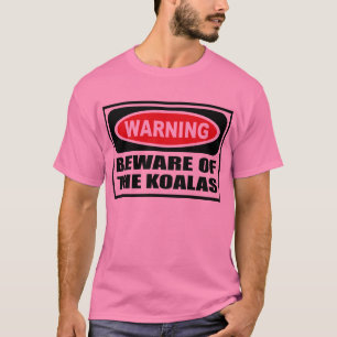 L'avertissement PRENNENT GARDE du T-shirt des
