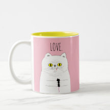 Le chat avec la souris rougissent tasse rose