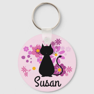Le chat dans le rose fleurit le porte-clés