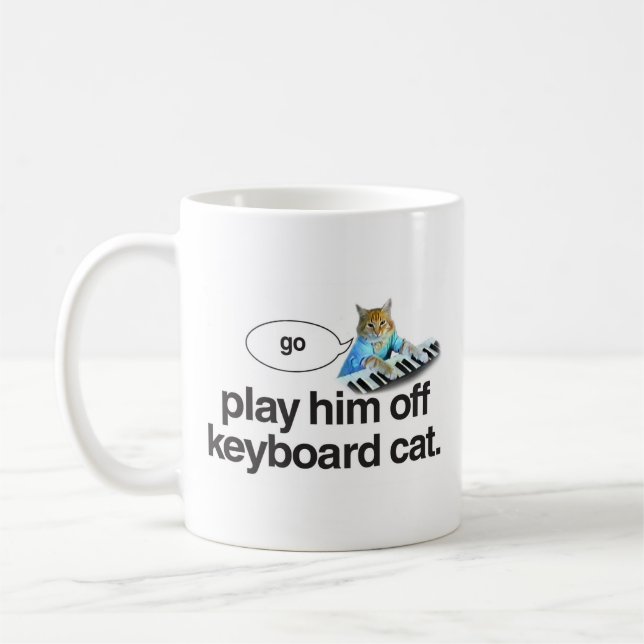 le chat de clavier vont tasse (Gauche)