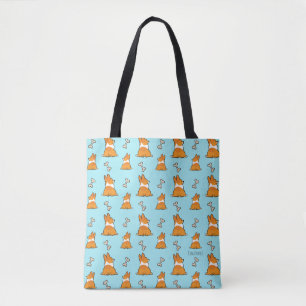 Le corgi aboute le sac fourre-tout de la meilleure