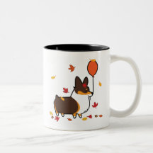 Le corgi tricolore tombe dans la tasse |