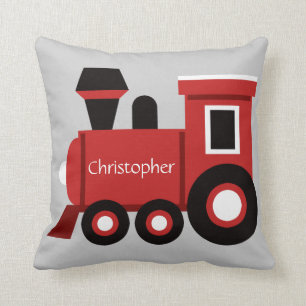 Le coussin du garçon mignon, train rouge avec le