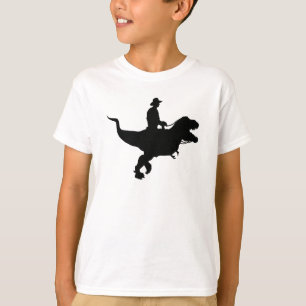 Le cowboy montant T-Rex badine le T-shirt
