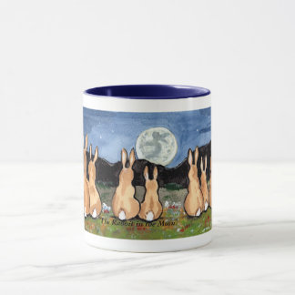 "Le lapin tasse de café de famille de lapin dans