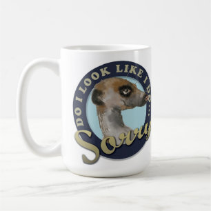 Le Meerkat avec la tasse d'attitude
