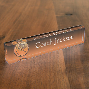 Le noir orange de basket-ball se fanent plaque