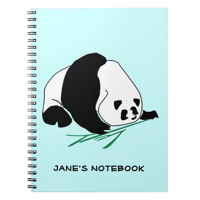 Le panda noir et blanc mange le carnet en bambou (Devant)