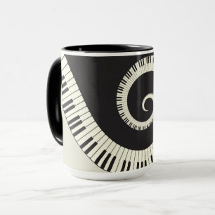 Le piano orienté de musique verrouille la tasse