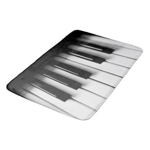 Le piano verrouille le tapis de bain