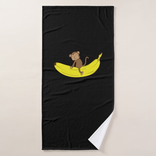Le singe monte sur la banane (Serviette de bain)
