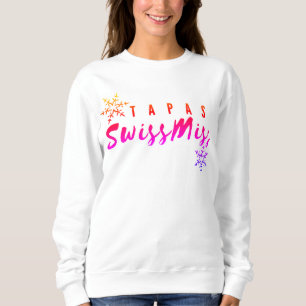 Le sweatshirt de Noël des Tapas Swiss Miss