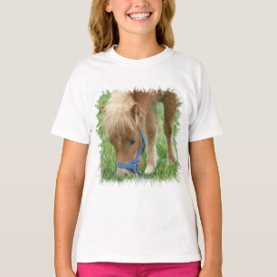 Le T-shirt de la fille de poney de Shetland