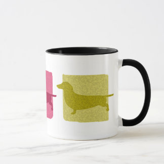 Le teckel coloré silhouette la tasse