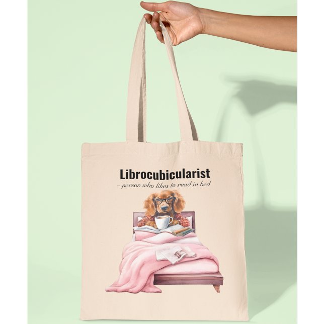 Lecture de chien dans le sac de livre de lit les a (Créateur téléchargé)