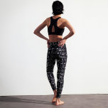 Leggings Abstrait moderne  noir et blanc Motif visage<br><div class="desc">Un design abstrait avec des dessins à lignes blanches de femmes à différentes faces est présenté dans un motif moderne sur un arrière - plan noir.</div>