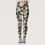 Leggings Baisson blanc sur motif floral noir<br><div class="desc">Ces leggings ont un joli design floral avec des marguerites blanches aux centres jaunes sur un arrière - plan noir. Idéal pour la salle de sport,  le travail ou simplement le farniente à la maison. Portez-les avec style ! Conçu par un artiste de renommée mondiale ©Tim Coffey.</div>