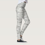 Leggings Boho lunaire noir et blanc, bandes horizontales<br><div class="desc">Cette conception est composée d'un motif horizontal de rayures blanches et irrégulières de saumons boho à l'encre noire sur un arrière - plan blanc. (L'encre noire est partiellement transparente et peut apparaître grise sur le produit fini.)</div>