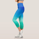 Leggings Capri Aquarelle Neon Océan Bleu Vert Été Thème<br><div class="desc">Ce design tropical présente un bel arrière - plan de plage bleu et vert de l'océan. Cliquez sur le bouton personnaliser pour plus de flexibilité dans la modification/ajout de texte ! Des variantes de cette conception ainsi que des produits de coordination sont disponibles dans notre boutique, zazzle.com/store/doodlelulu. Contactez-nous si vous...</div>