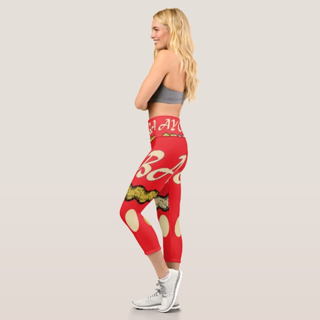 Leggings Capri Ayoba design africain rouge vif et moutarde (Gauche)