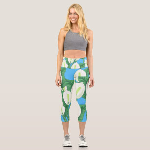 Leggings Capri Lys blancs sur arrière - plan bleu pâle