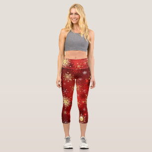 Leggings Capri Noël Golden Snowflakes sur Arrière - plan rouge
