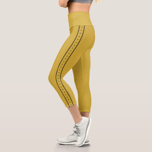 Leggings Capri Or métallisé rayé sur le côté noir