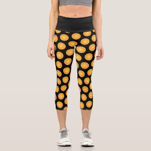 Leggings Capri Tranches de fruit orange juteux cool sur fond noir
