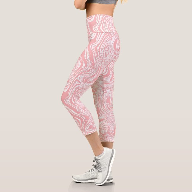 Leggings Capri un design abstrait rose et blanc sur un fond blanc (Gauche)