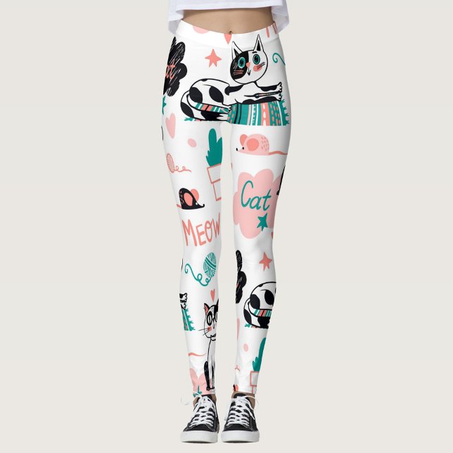 Leggings Chats (Colorful cat-themed leggings against a neutral background.  )