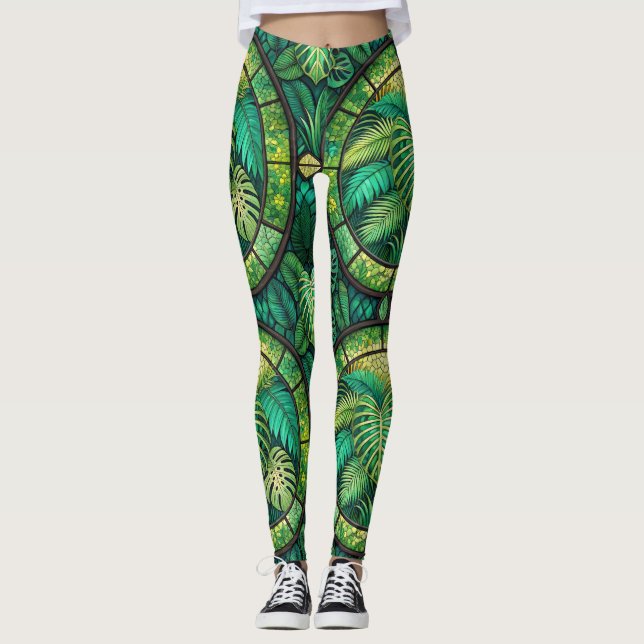 Leggings featuring a vibrant green tropical leaf  (Devant)