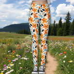 Leggings Feuillage et fleurs orange et bleu<br><div class="desc">Fleurs orange,  légumineuses florales bleues et vert foncé pour femmes.</div>