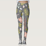 Leggings Gris de charbon, vert citron vert et corail<br><div class="desc">La combinaison de couleurs modernes sur ces légumineuses imprimées combinées avec le motif botanique et fleuri, vont certainement tourner certains têtes. Ces leggings ont un arrière - plan gris fusain avec un imprimé brillant et audacieux en rose corail, vert citron, bleu clair et blanc représentant des feuilles et des fleurs....</div>