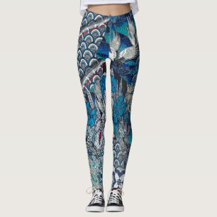 Leggings Grues bleues volant au-dessus des fleurs