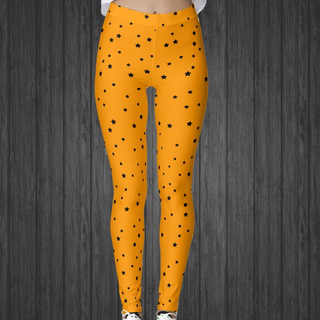 Leggings Halloween Couleurs étoiles noires sur orange brill (Halloween colours of black stars on bright orange celestial womans leggings.)
