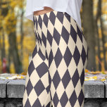 Leggings Harlequin en noir gras et Motif chèque en arlequin<br><div class="desc">Striking and Chic : Ajoutez un contraste audacieux à votre garde-robe avec ces leggings motifs Arlequin ! Leurs couleurs vives et leur design unique sont parfaits pour faire une déclaration puissante dans toute tenue décontractée. Confortables et élégantes, ces leggings sont idéaux pour tous ceux qui aiment se démarquer. N’attendez pas,...</div>