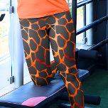 Leggings Imprimer Giraffe Jungle<br><div class="desc">Ces leggings sont magnifiquement conçus avec un motif hypnotisant orange et noir girafe taches, offrant un ajout unique et élégant à votre garde-robe. La motif présente les endroits distinctifs et élégants caractéristiques des girafes, créant un look sophistiqué et attrayant. Les leggings sont faits de tissu extensible et de haute qualité,...</div>