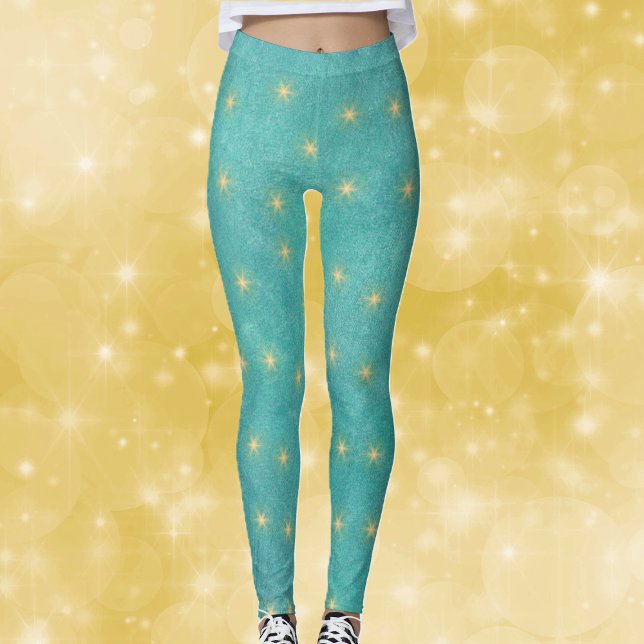 Leggings Joli sarcelle vibrant avec des étoiles dorées bril (Vibrant teal coloured Chrismtas womans leggins with bright glowing gold stars.)