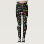 Leggings Les lunettes en verre ont modelé le noir de<br><div class="desc">Ces guêtres imprimées ont un arrière - plan noir et partout une copie des cadres ou des lunettes en verre dans le vert de chaux,  le bleu électrique,  le magenta et le blanc. Lunettes d'amour ? Vérifiez la collection spectaculaire de lunettes des conceptions d'astérisque les produits coordonnés.</div>