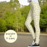 Leggings Motif Feuille Verte Sur Arrière - plan Jaune Paste<br><div class="desc">Ce design de style nature présente une branche verte et un motif feuille sur un arrière - plan jaune pastel.</div>