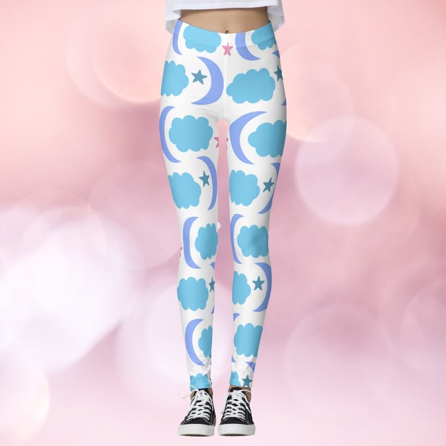Leggings Motif Nuages Étoiles Lune Bleu Violet (A pair of leggings with a pattern of purple moon, blue clouds and pink stars)