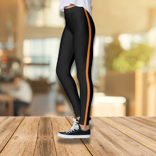 Leggings noirs élégants avec bande latérale orange