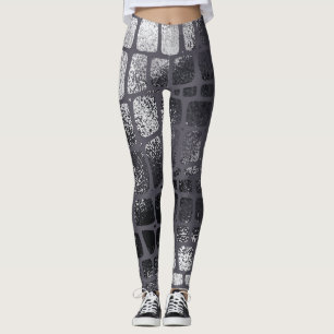 Leggings Peau de serpent noir métallique : Texture élégante