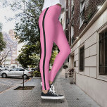 Leggings roses vibrants avec bande latérale noire<br><div class="desc">Ajoutez une pop de couleur à vos vêtements actifs avec ces leggings roses audacieux, avec une bande de côté noir et élégant pour un contraste saisissant. Conçues pour faire une déclaration à l'intérieur et à l'extérieur de la salle de sport, ces leggings allient style avant-garde et confort ultime. L'ajustement haut...</div>