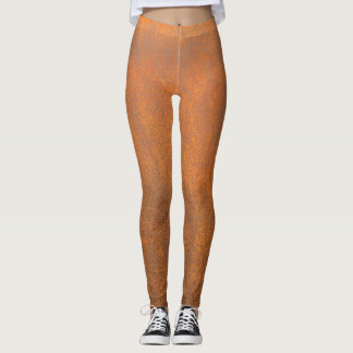 Leggings Rouille noire, texture métallique gros plan.