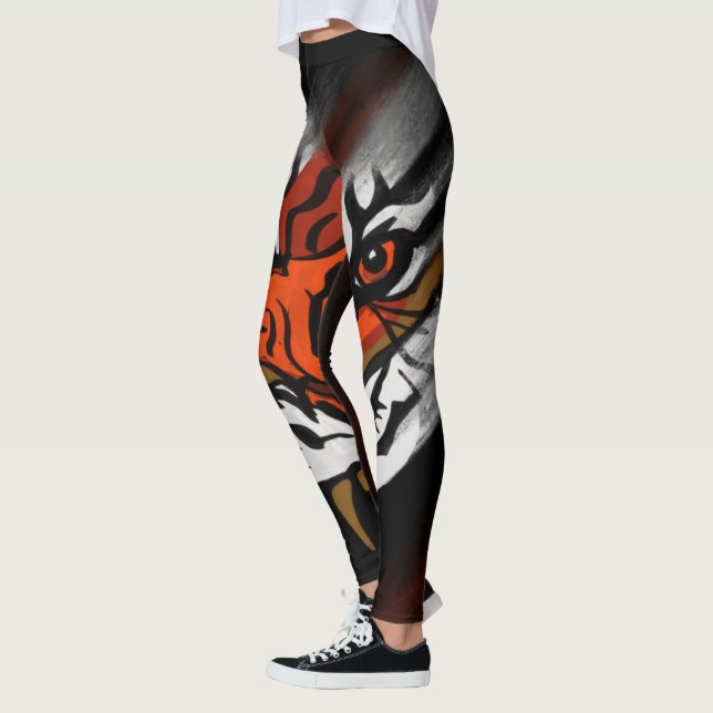 LEGGINGS STRIPES ORANGE ET NOIR (Gauche)
