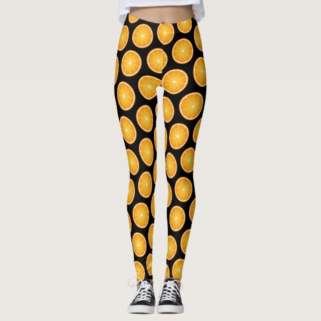 Leggings Tranches de fruit orange juteux cool sur fond noir (Devant)