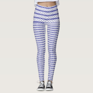 Leggings Un ciel bleu vif avec des nuages blancs épars.